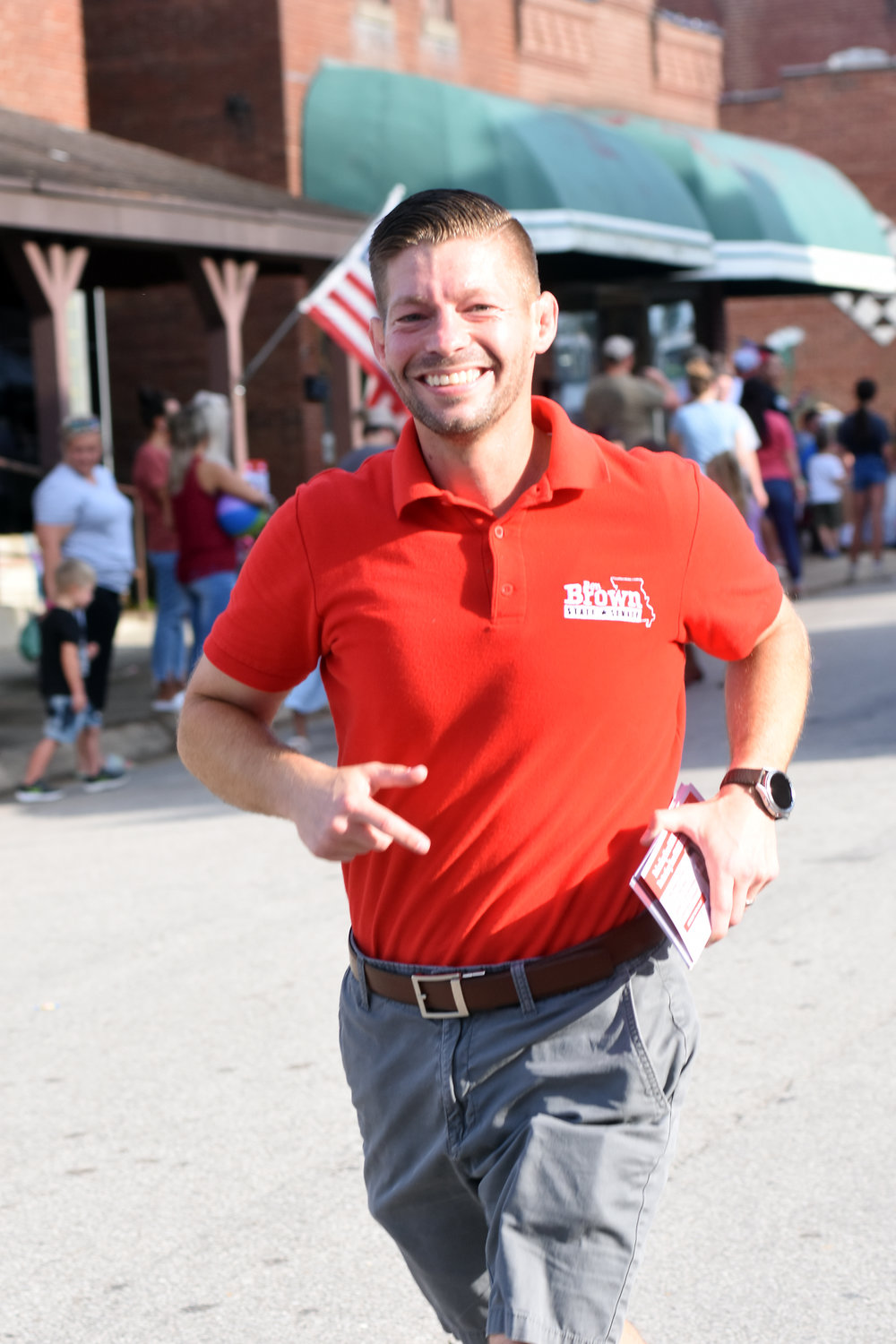 Ben Brown received just over 1,000 votes in Gasconade County to help him win the 26th Senate District primary over four Republican challengers. He jogs to keep up with his parade walkers after stopping to greet people along First Street. He will face Democrat John Kiehne on Nov. 8.